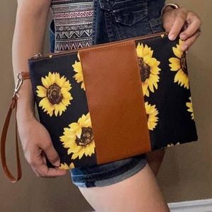 Sun flower clutch bag. It’s really good size